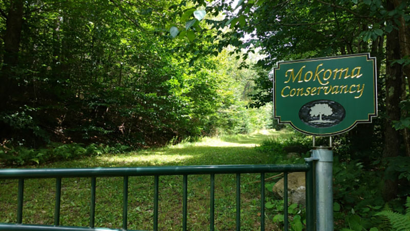 A sign marking the entrance of Mokoma Conservancy in Laporte, PA.