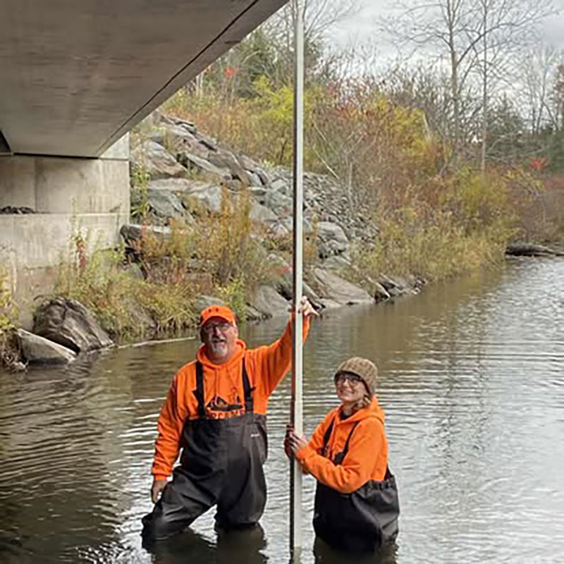 Eastern Pennsylvania Coalition for Abandoned Mine Reclamation volunteers work in a local waterway. 
