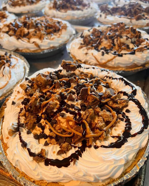 A cream pie topped with shavings and chocolate drizzle from Gino’s Bistro and Bar in Throop, PA.