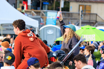 A girls sits on top of her friend's shoulders and cheers for the band at Mountainfest at Montage Mountain in Moosic, PA.