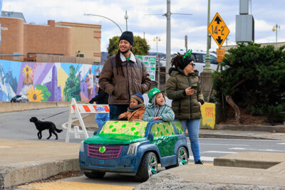 A family watches at the parade comes close during the St. Patrick's Day parade in Scranton, PA.