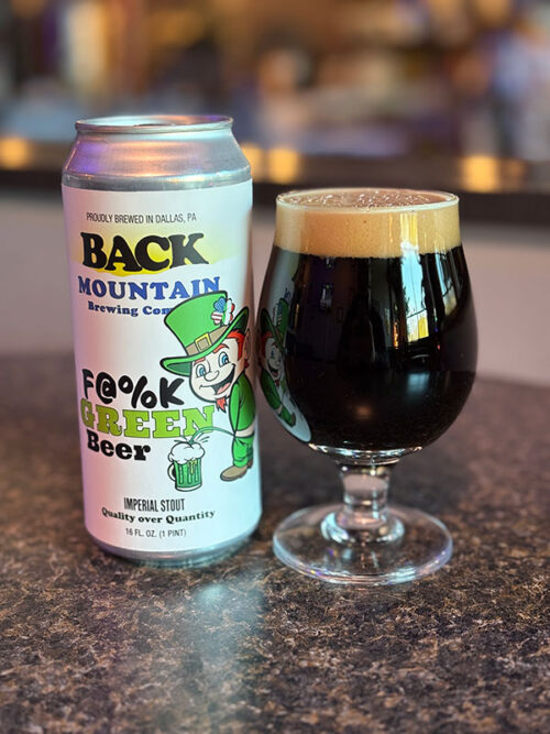 A can and a pint of stout on the bar at Back Mountain Brewing Company in Dallas, PA.