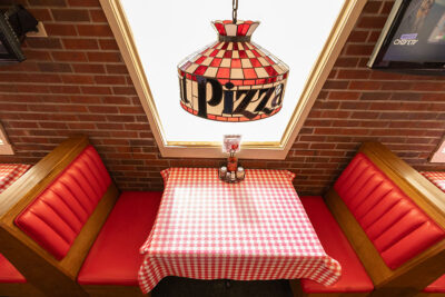 An overhead angle of the lamp and booths at Pizza Hut Classic in Tunkhannock, PA.