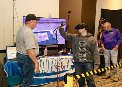 Students get a first hand experience in virtual reality during a career exploration event at the Mohegan Pennsylvania Convention Center in Wilkes-Barre, PA.
