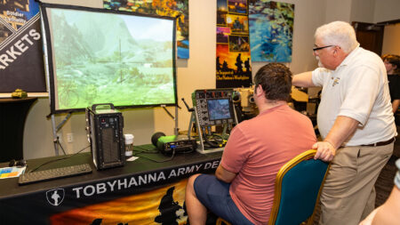 A students gets hands on experience with a computer system during a career exploration event at the Mohegan Pennsylvania Convention Center in Wilkes-Barre, PA.
