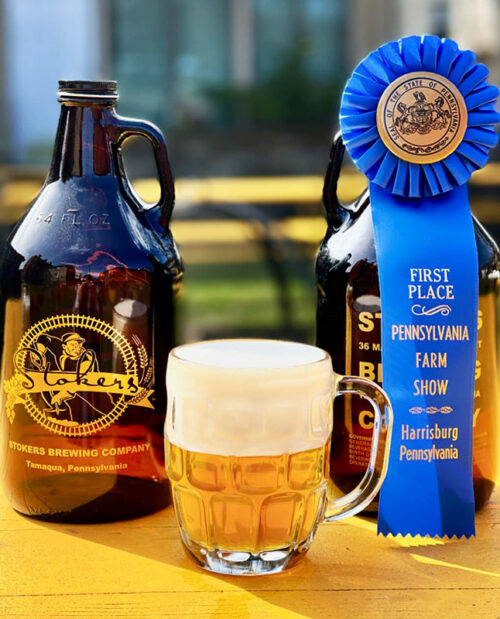 A liter of pilsner alongside a 1st place blue ribbon at Stoker's Brewing Company in Tamaqua, PA.